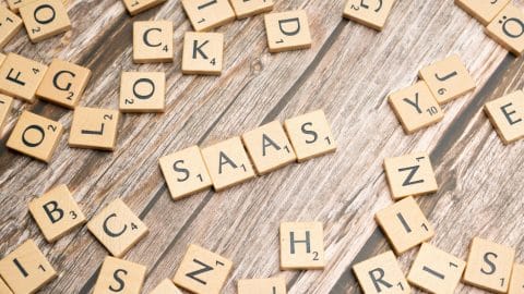 scrabble-letters-spelling-saas-on-a-wooden-tabl